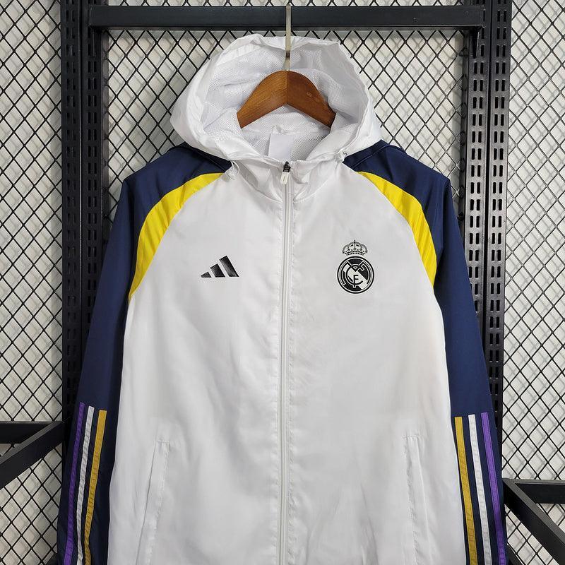 Jaqueta Corta-Vento Real Madrid 23/24 Masculino Adidas - Branco Azul Amarelo - JH ESPORTES - CAMISA DE TIMES